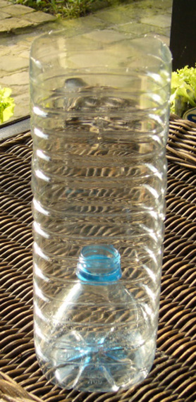 moesttuin in een plastieke fles